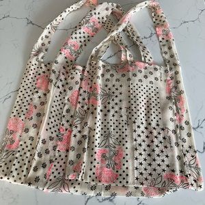 Free People shopping bags.